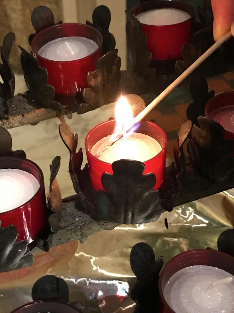 LIGHTING A CANDLE FOR JIM